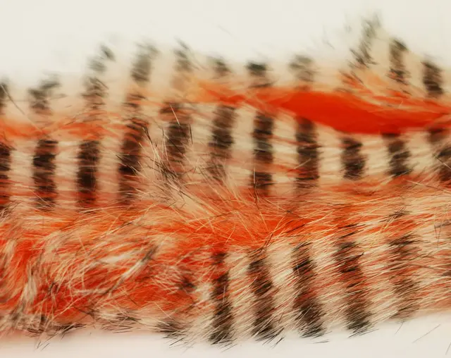 Tiger Barred Magnum Rabbit Strips Black Barred/White Tipped Hot Orange 